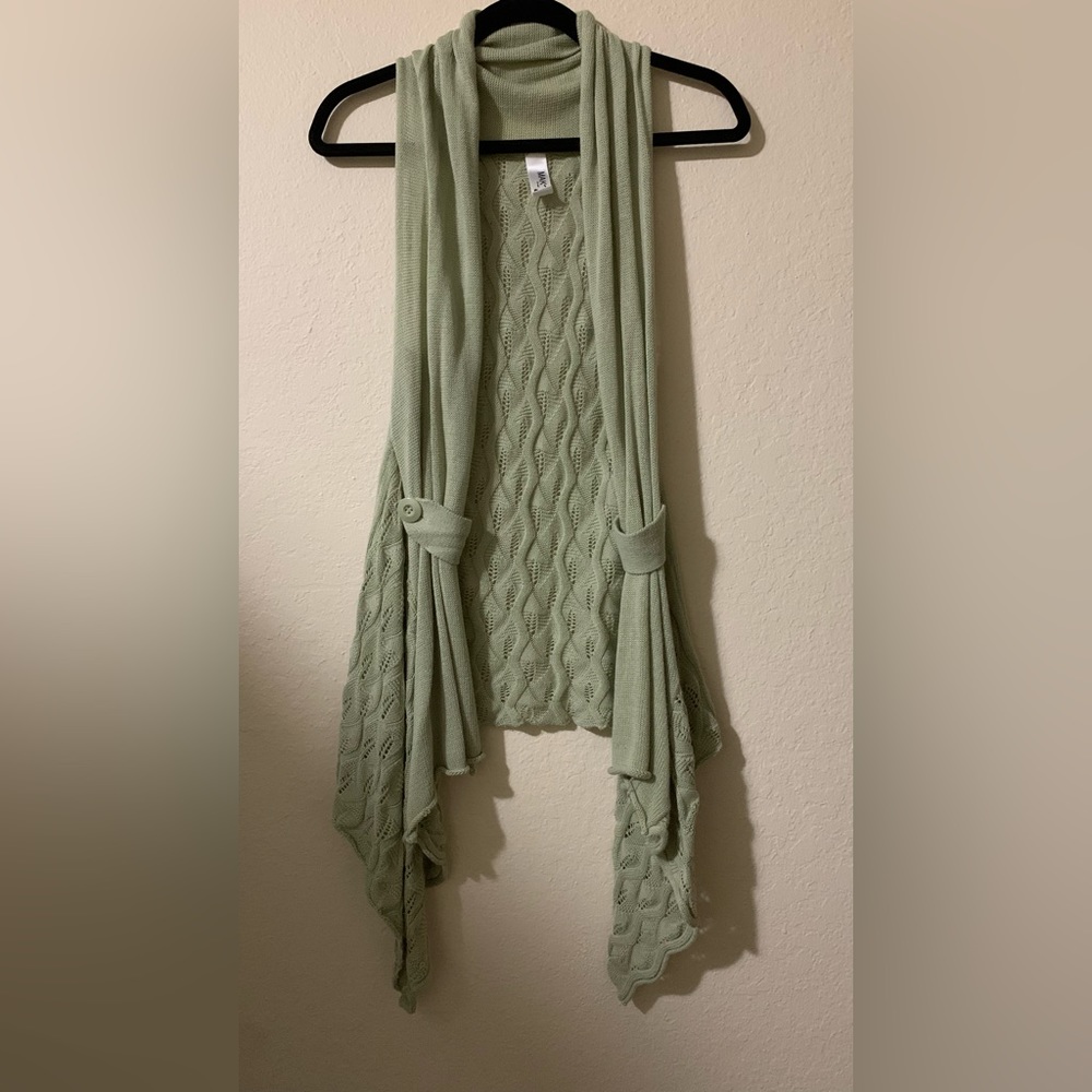 Light green cardigan size M.
